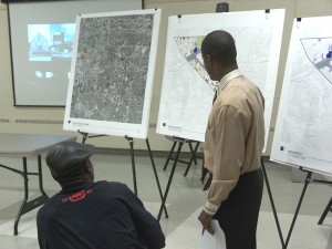 Master Planning BBC Executive Director Timothy Tramble highlights components of the Ward 5 Master Plan to a resident