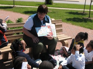 Reading A teacher reads to her Stokes Central Academy students at the Reading Garden, Central Avenue and East 40th Street